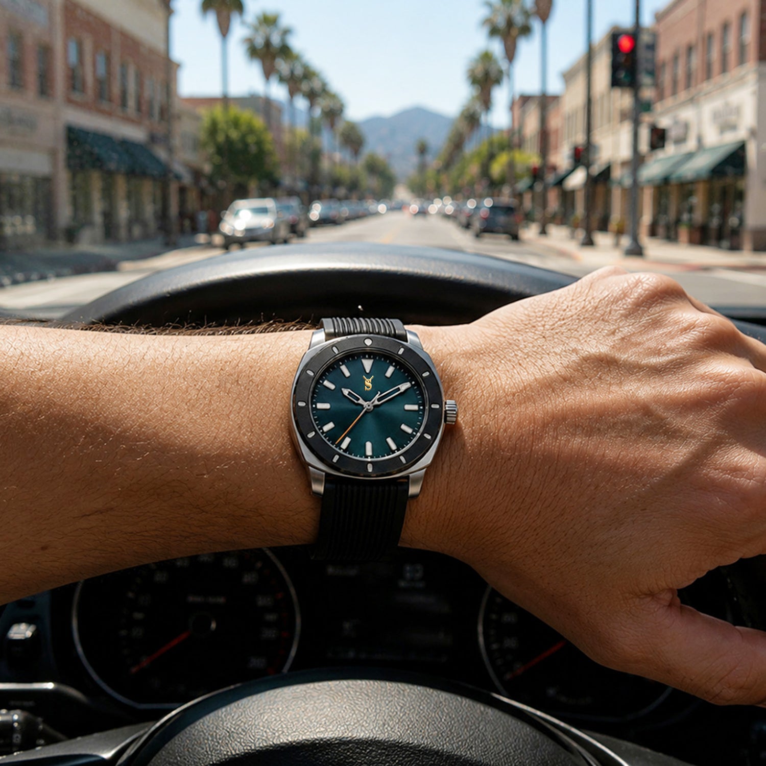 Person wearing a watch with a city street in the background