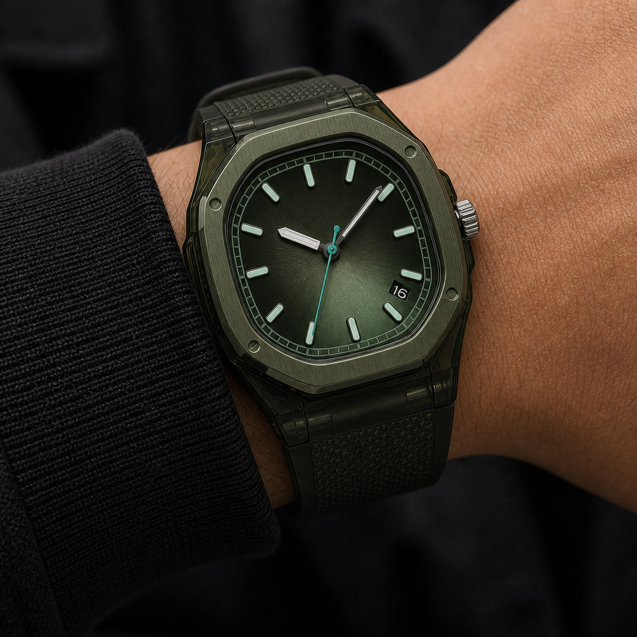 Green watch on a wrist with a dark background