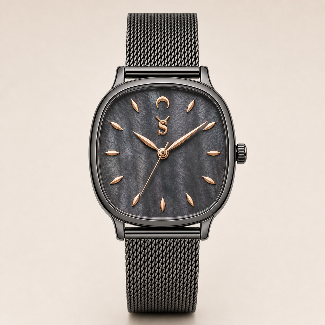 Black watch with rose gold accents on a beige background
