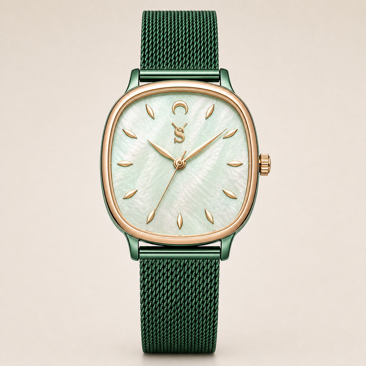 Green watch with a detailed face on a beige background