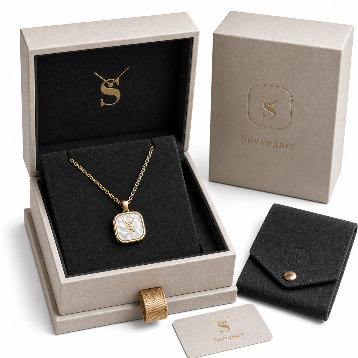 Gold necklace in a Savvenart box with matching pouch and card on a white background