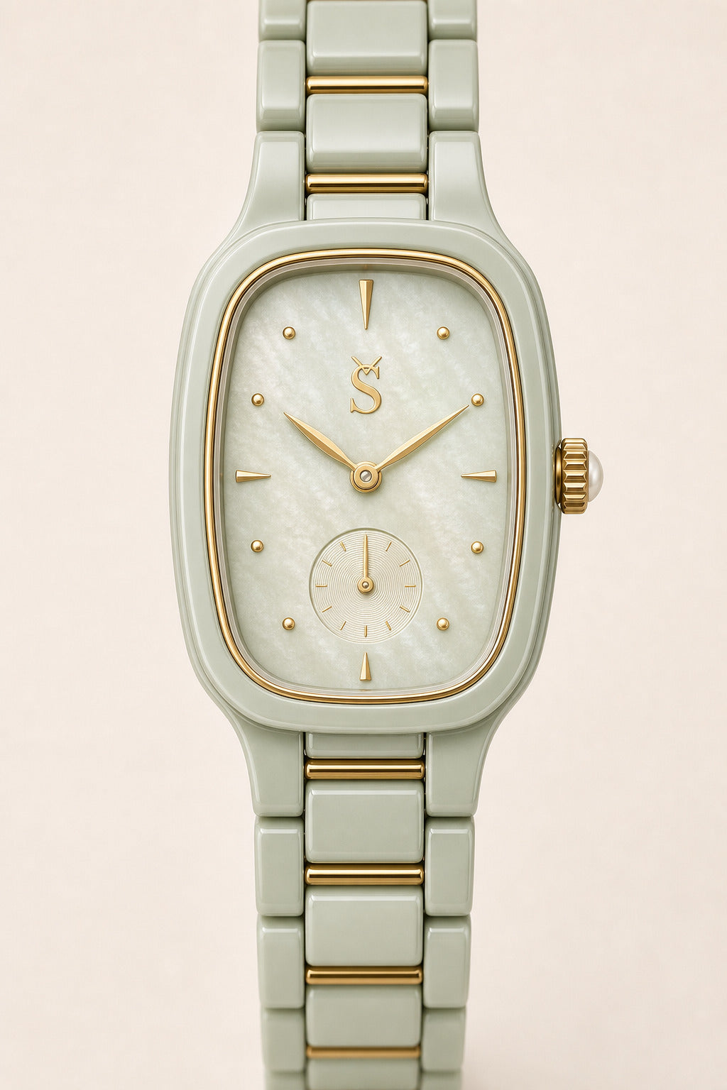Mint green watch with gold accents on a light beige background